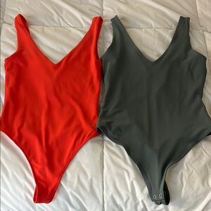 Two bodysuits